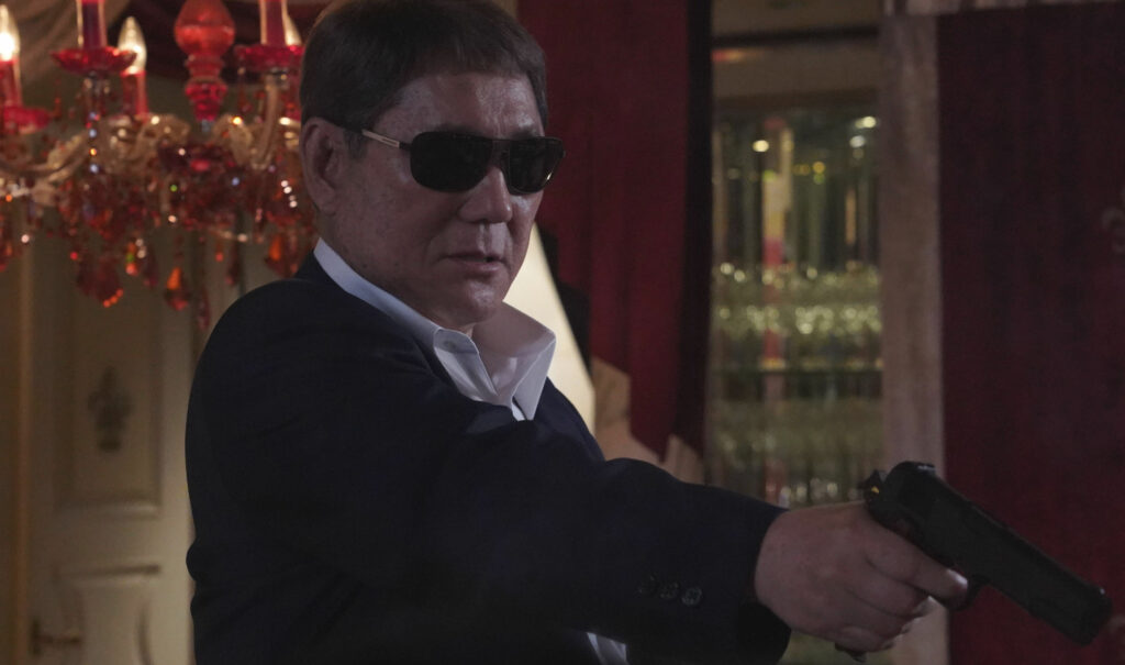 Broken Rage, le prime immagini del Takeshi Kitano di Venezia 81